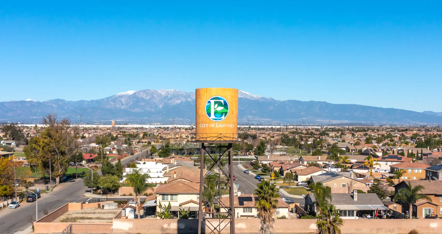 City of Eastvale water tower above Eastvale, CA neighborhoods where Gopher Stop provides gopher control