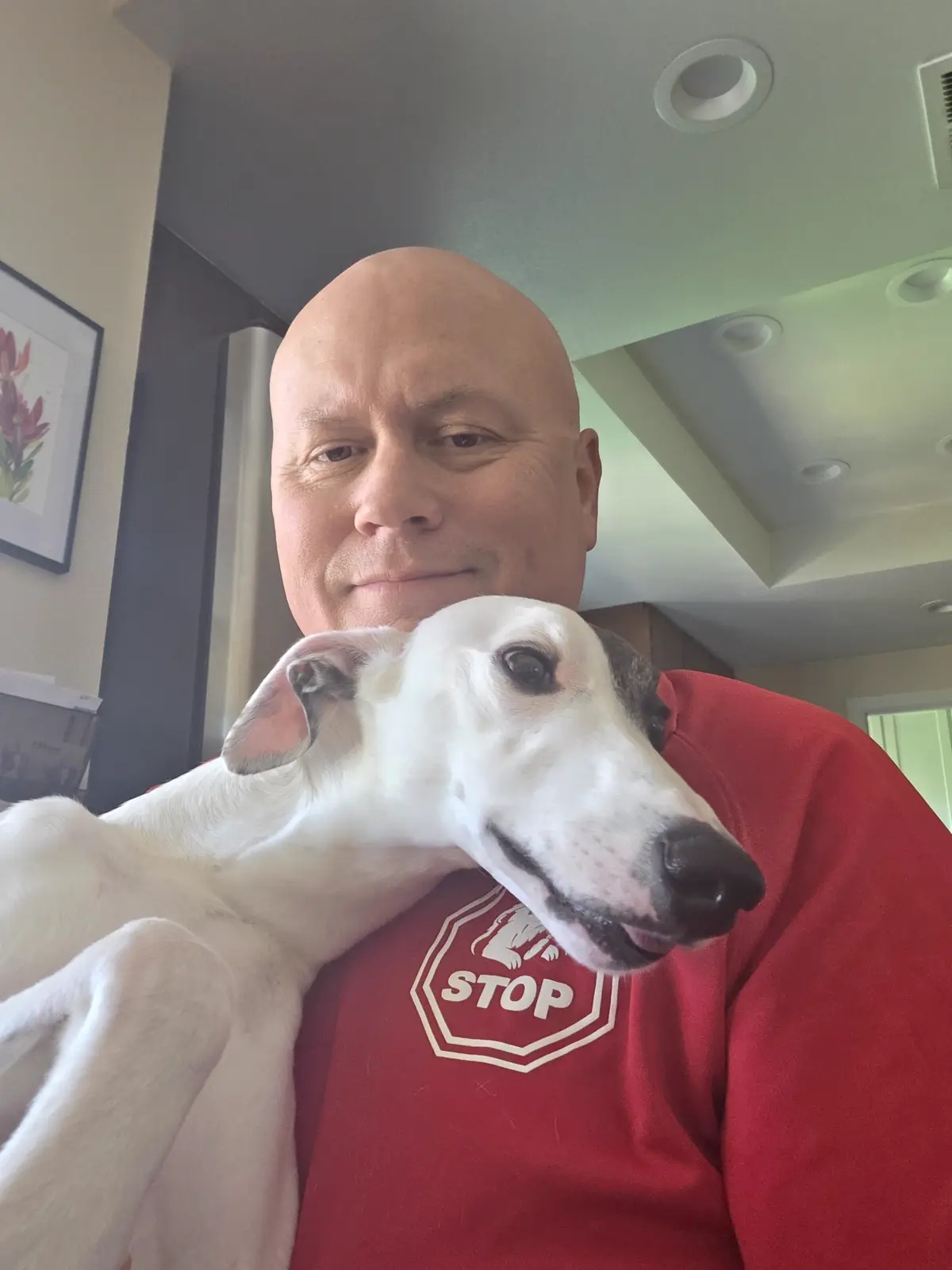 Gopher Stop owner with a dog in a cleared yard, showing the pet-safe result on a Yucaipa, CA property