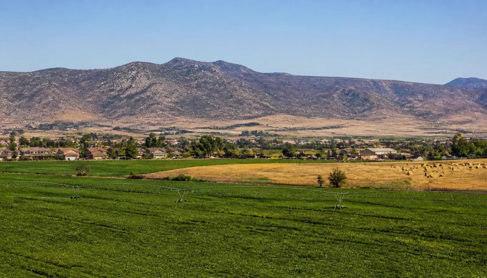 Green Winchester and French Valley neighborhoods beside rolling natural hills